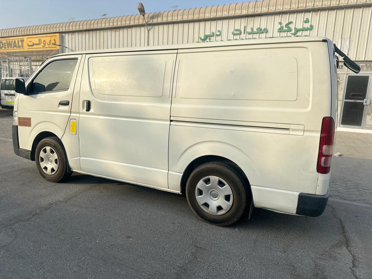 White Toyota Hiace van from Dubai Van Movers